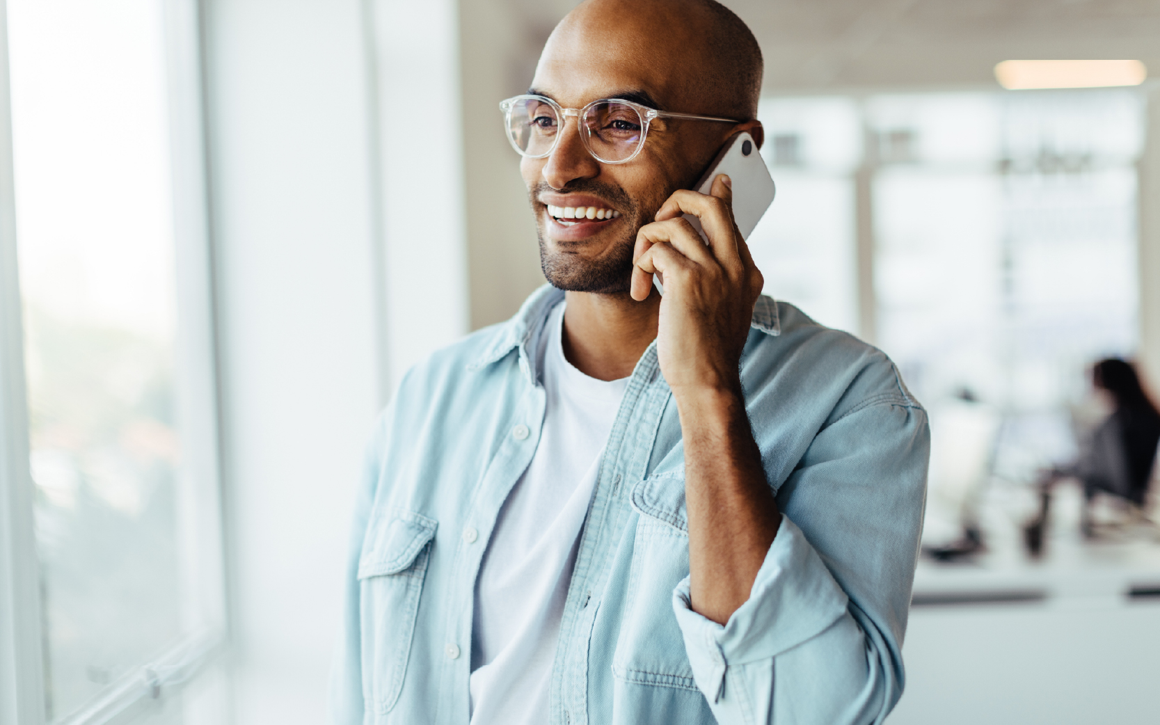 gentleman smiling talking on the phone