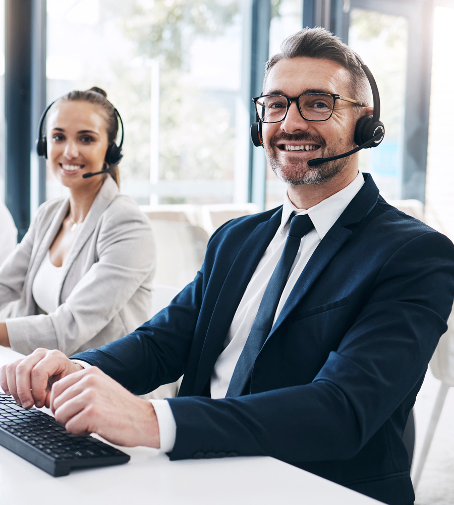 happy customer service agents with headsets