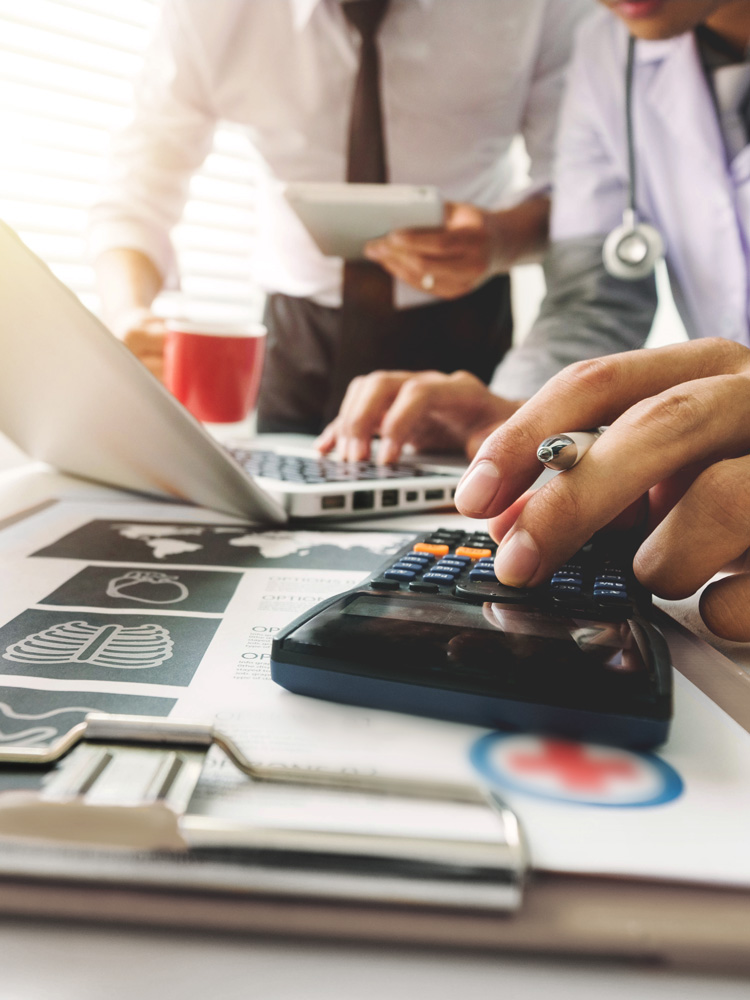 Cash Posting Services 1 Young woman holding claim documents checking information in office