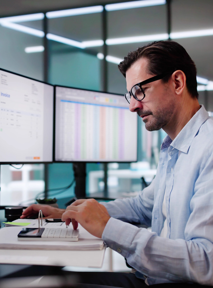 man working as a medical biller