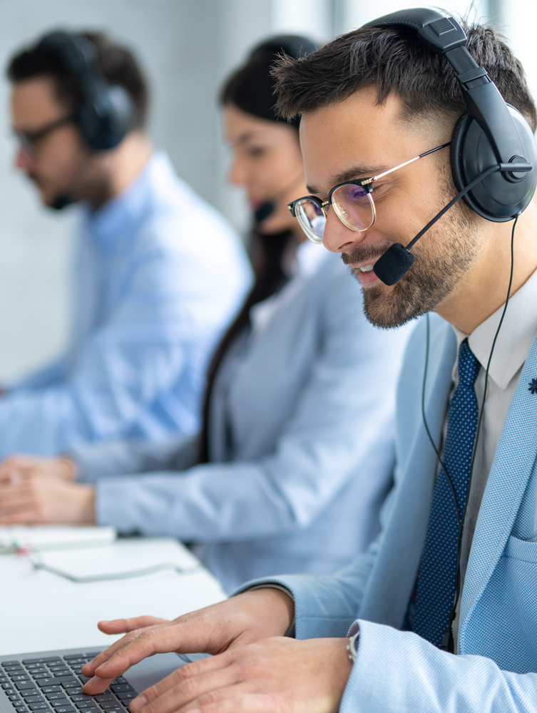 Customer service IT representatives with headsets talking to customers