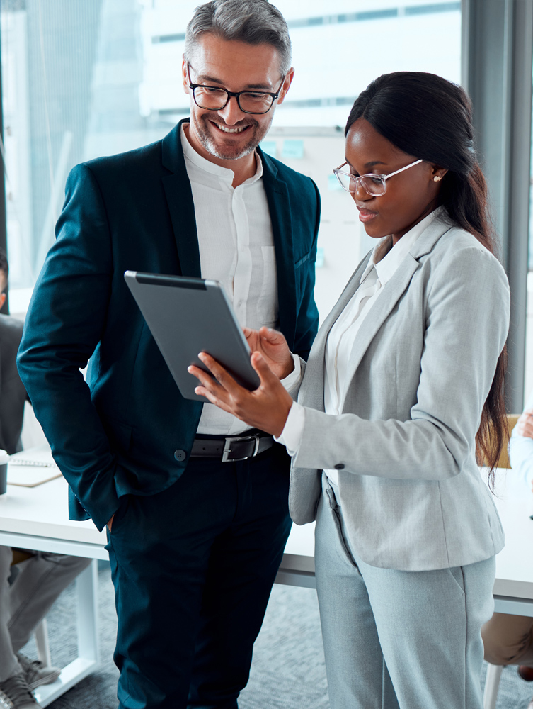 IT personnel talking while review a tablet