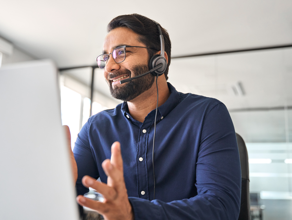 customer service wearing headset talking to client