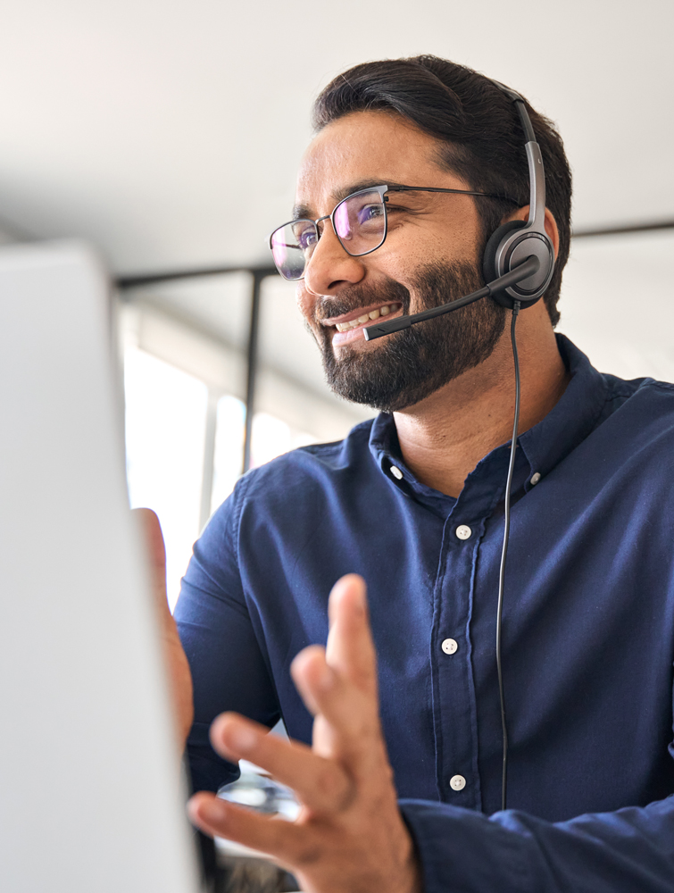 customer service wearing headset talking to client